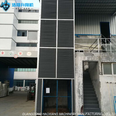 Un buen precio. Elevador hidráulico industrial de mezanino de varios pisos 5T 10M para almacenamiento de mercancías en línea